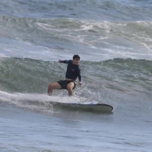 Grok Imagine prompt: Surfer riding a pipeline wave